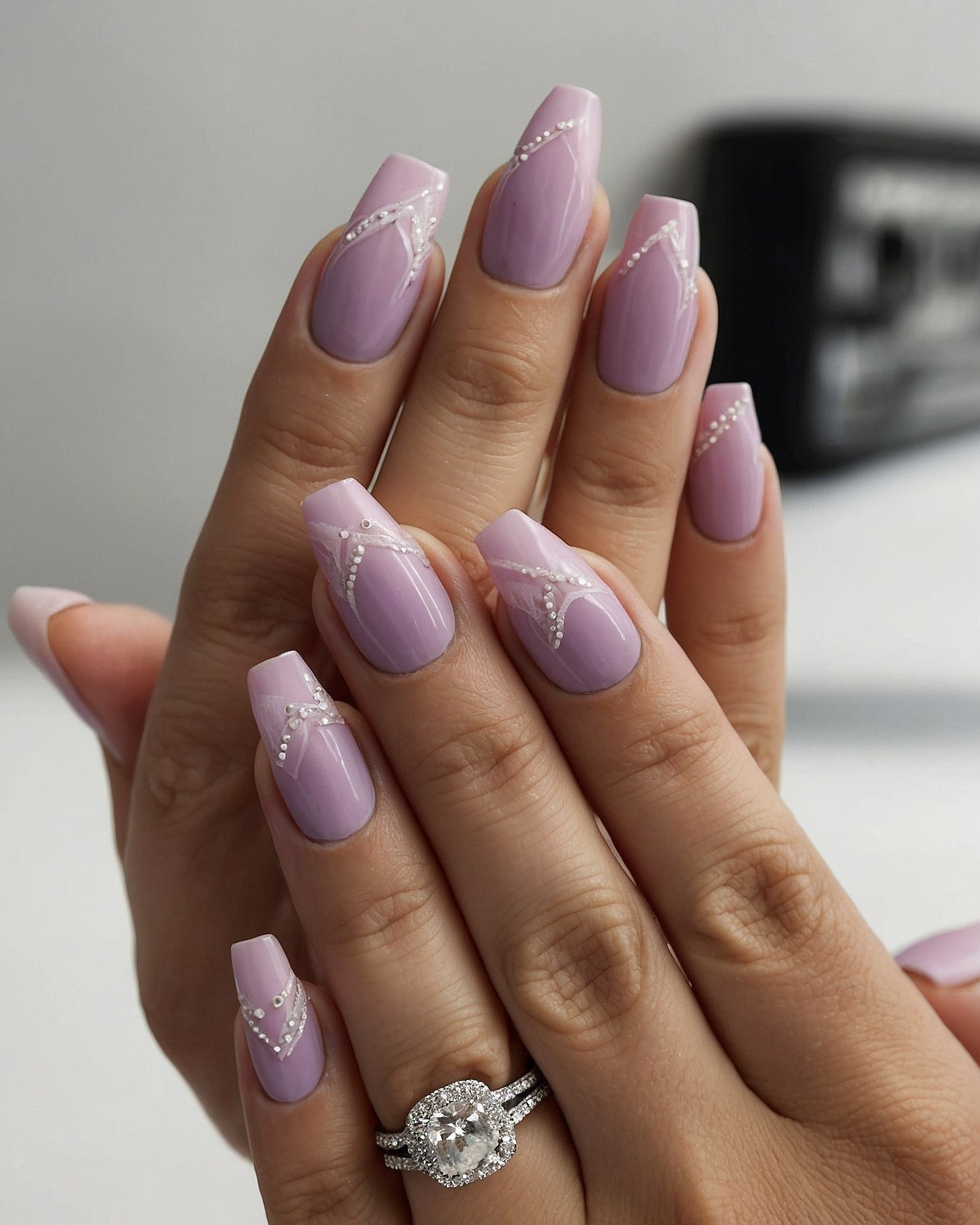 Elegant Lavender Coffin Nails with Delicate Silver Accents