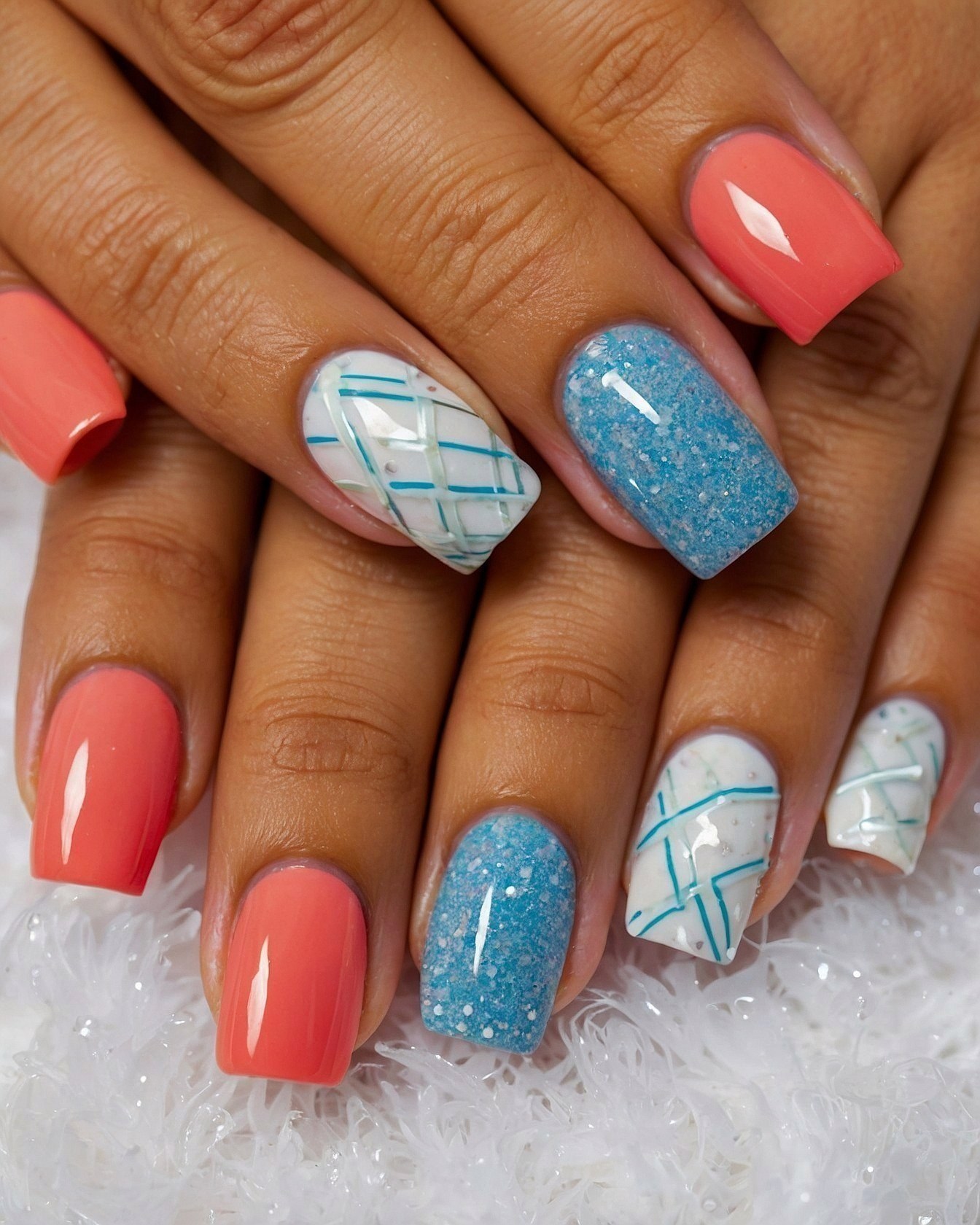 Coral and Teal Geometric Nail Art
