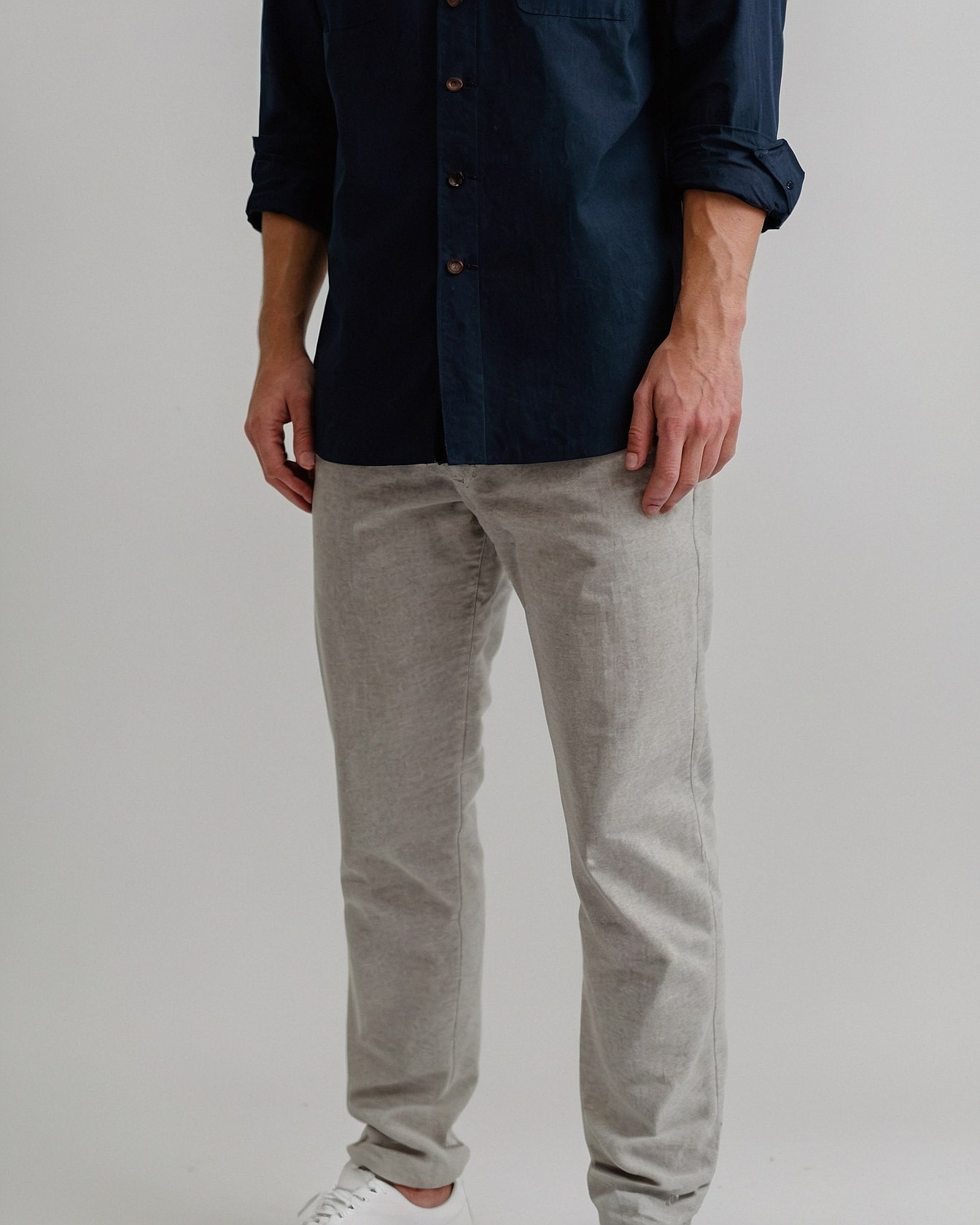Casual ensemble focusing on tailored trousers