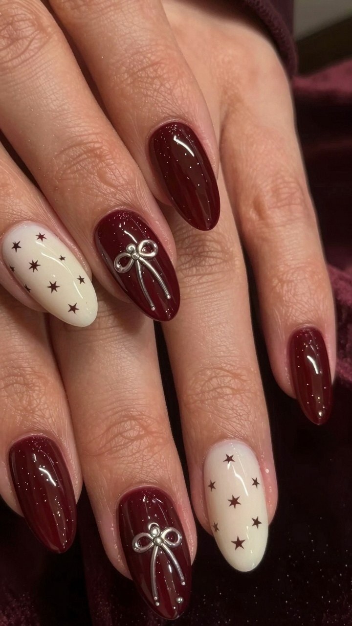 Deep Red and Cream Nails with Metallic Accents