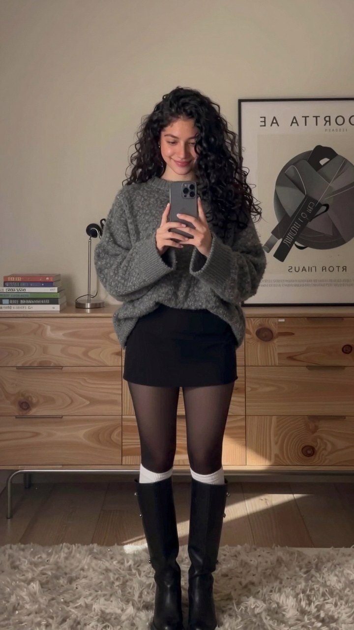 Styling a Cozy Knit Sweater With a Dark Denim Mini Skirt