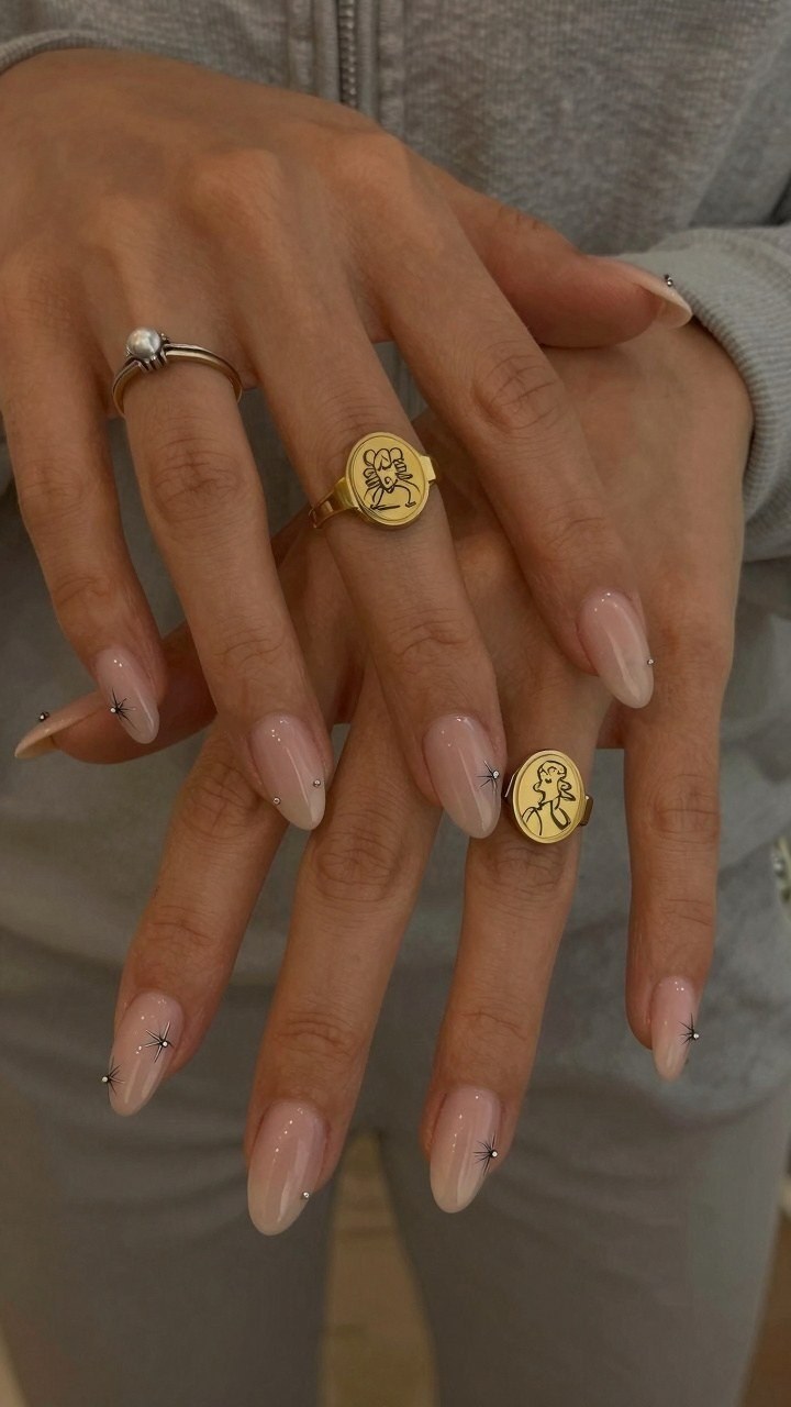 Pairing Almond Nails With Minimalist Metal Accents