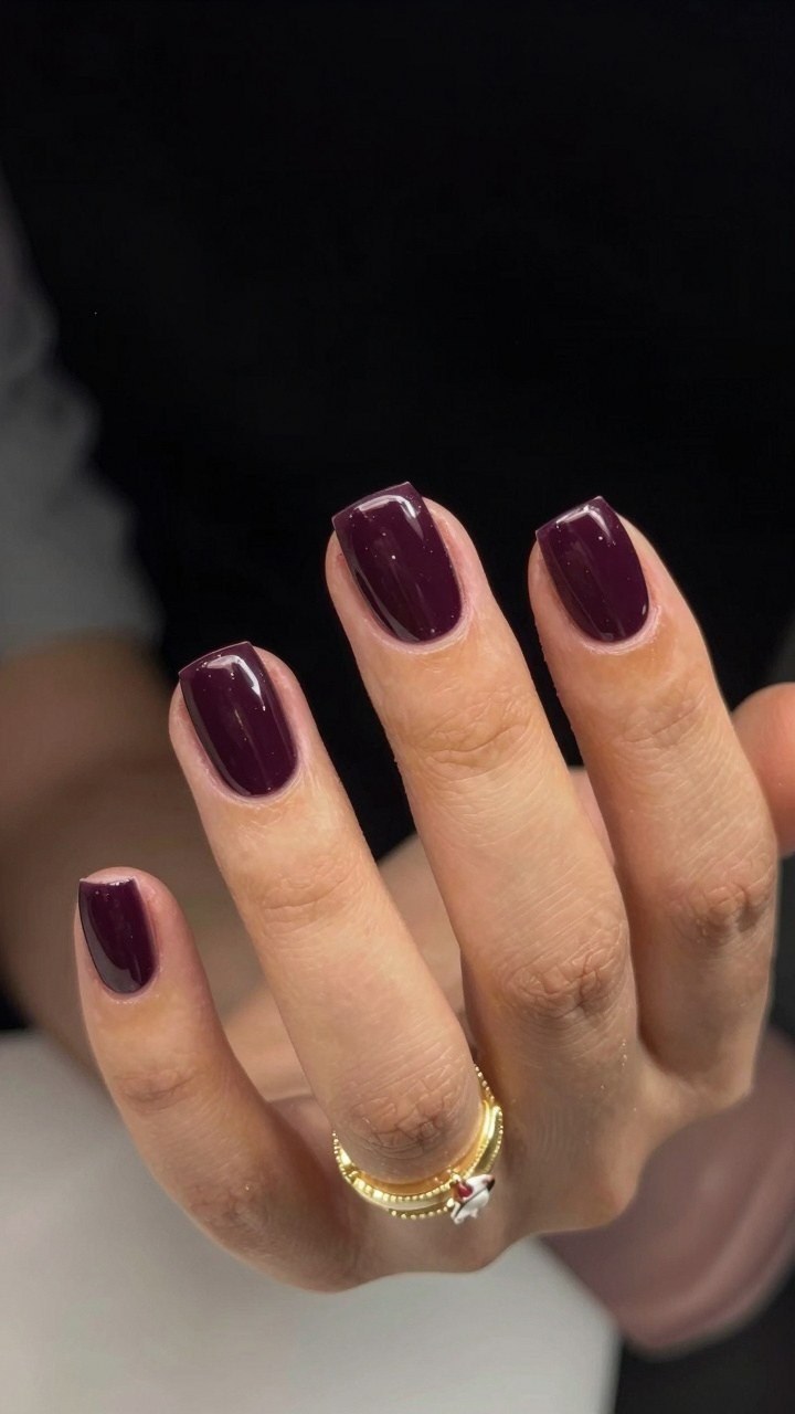 Why Glossy Deep Burgundy Nails Complement Fall Style