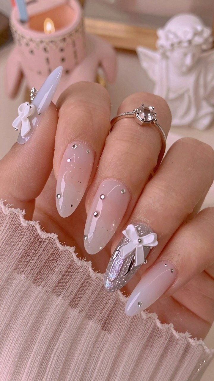 Soft Milky Gel Nails with Rhinestones and Bows