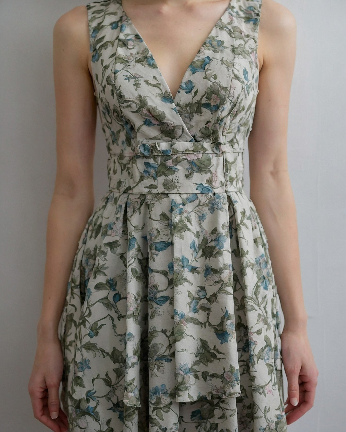 Buttoned Waist Detail on a Floral V-Neck Dress