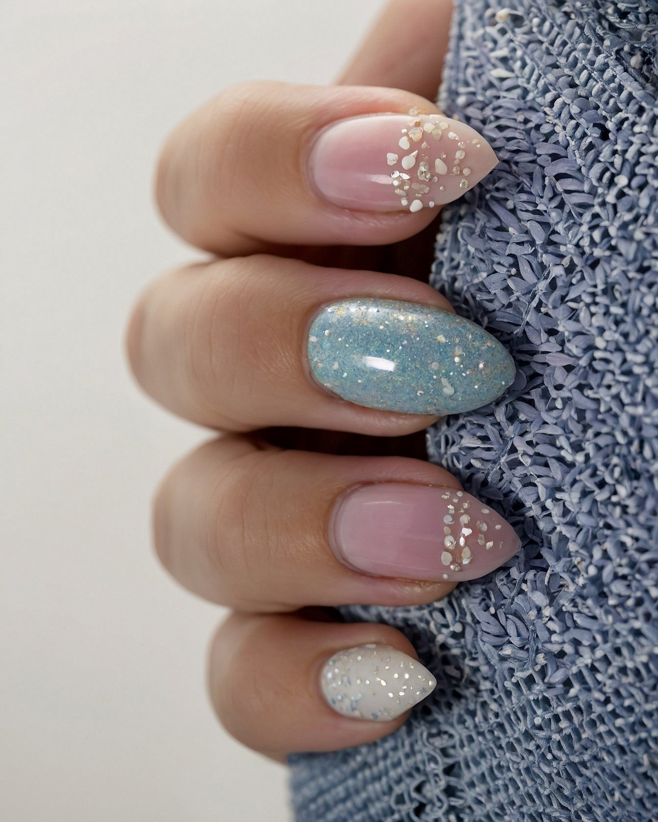 Delicate pearl accents on sheer polish