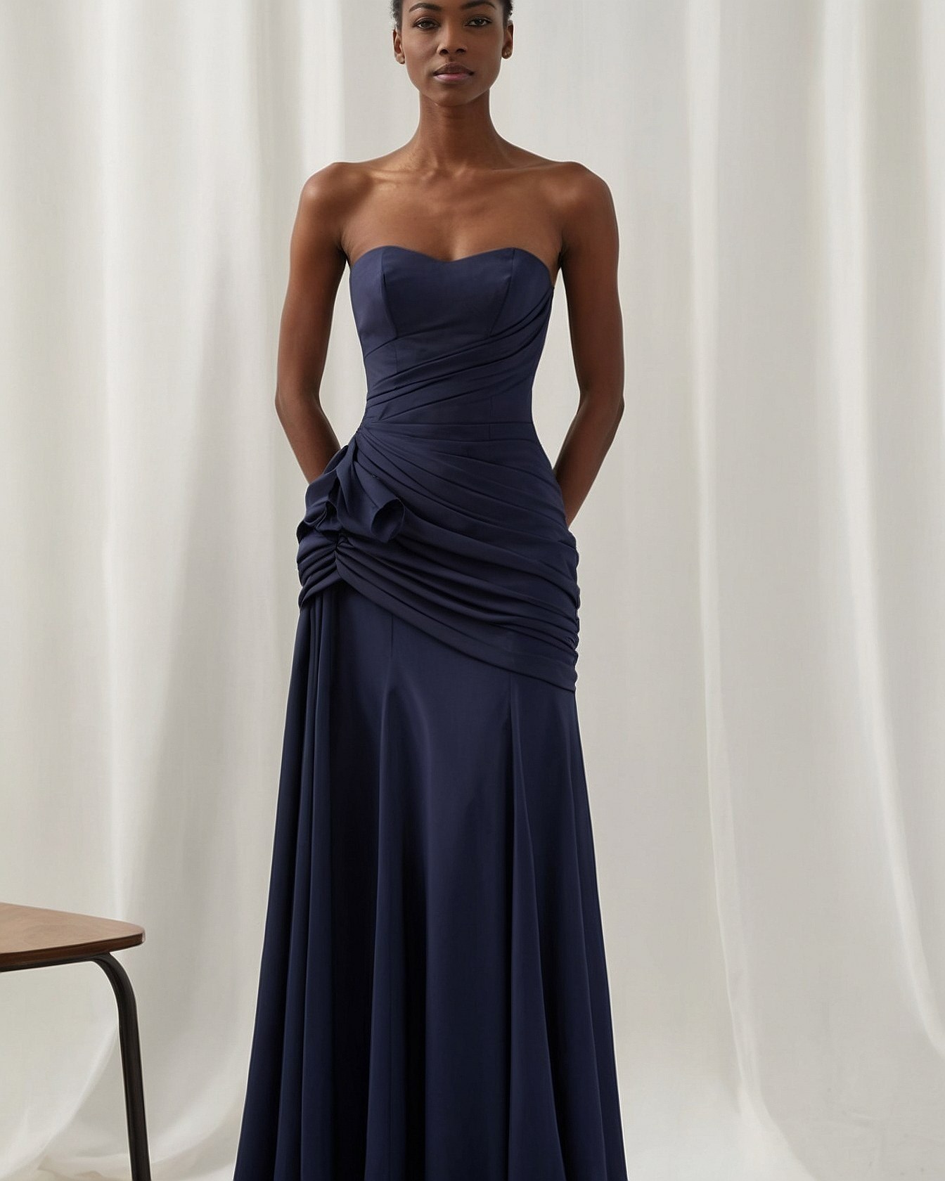 Structured Bodice and Cascading Draping Detail