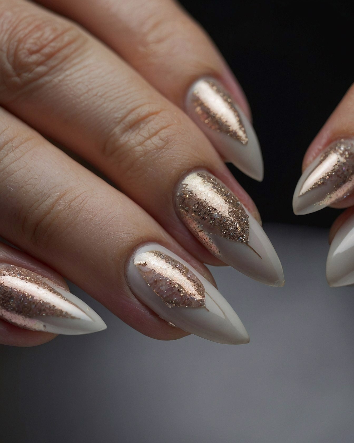 Closeup on Almond Nails with Rose Gold Leaf Accent
