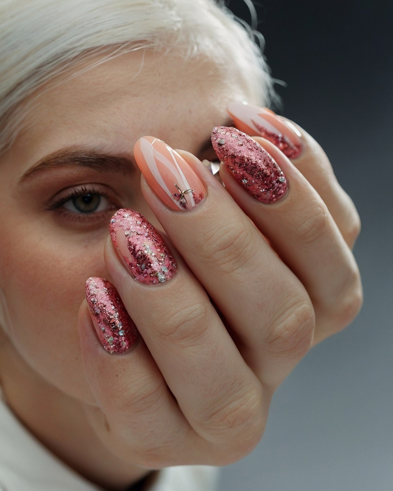 Close-up of Glitter and Swirl Nail Art