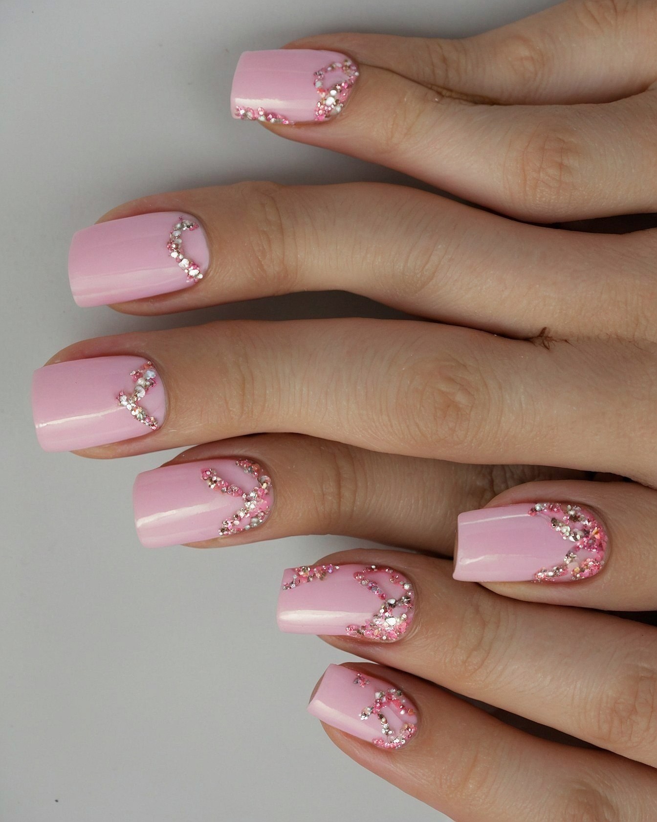 Square Pink Nails with Glitter Accents