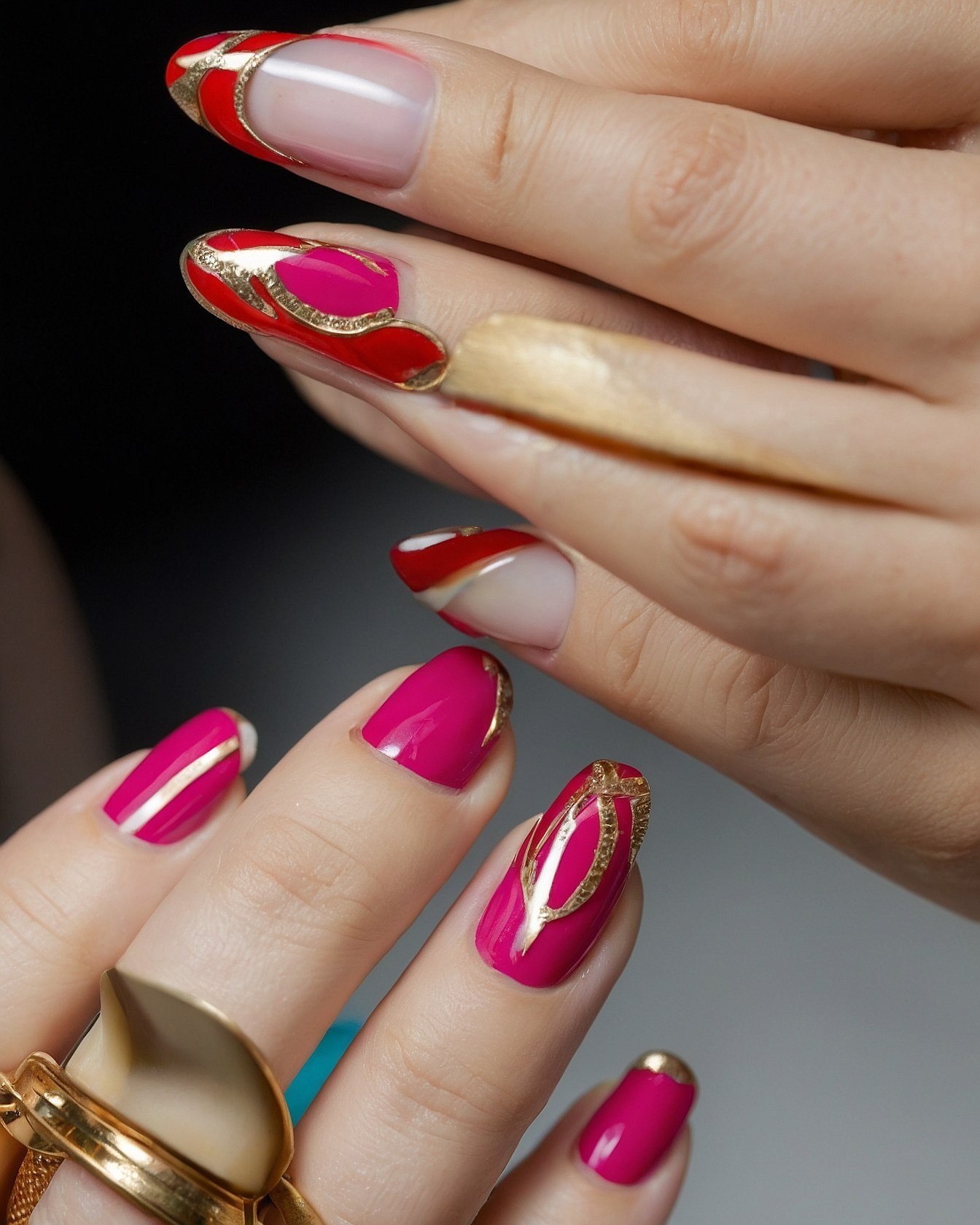 Close-Up of Bold Red and Pink French Tip Accents
