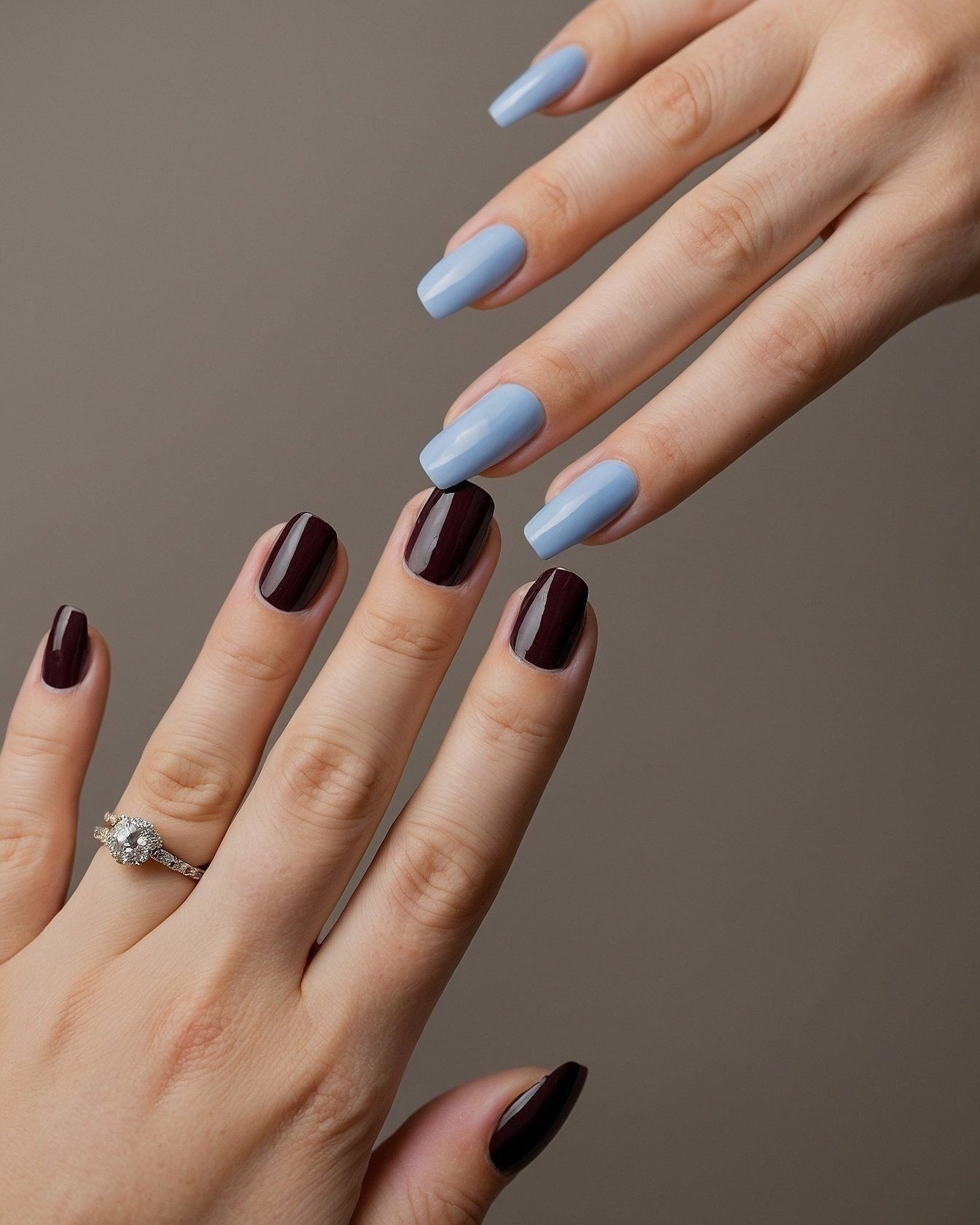 Soft Blue and Deep Plum Nail Contrast