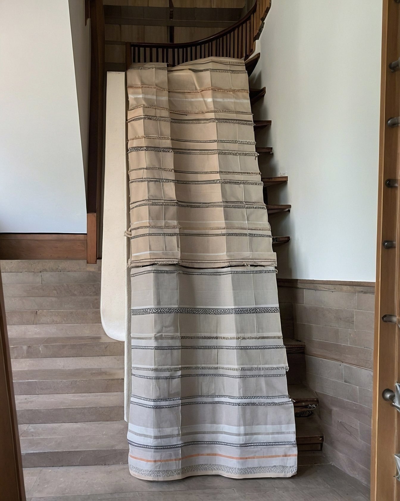 Striped Fabric Draped on Staircase