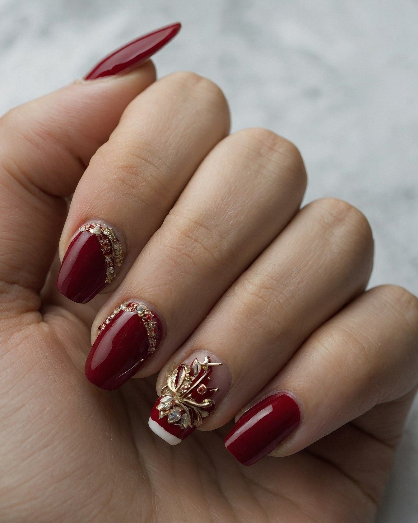 Deep Burgundy Almonds Adorned with Gold Metalwork