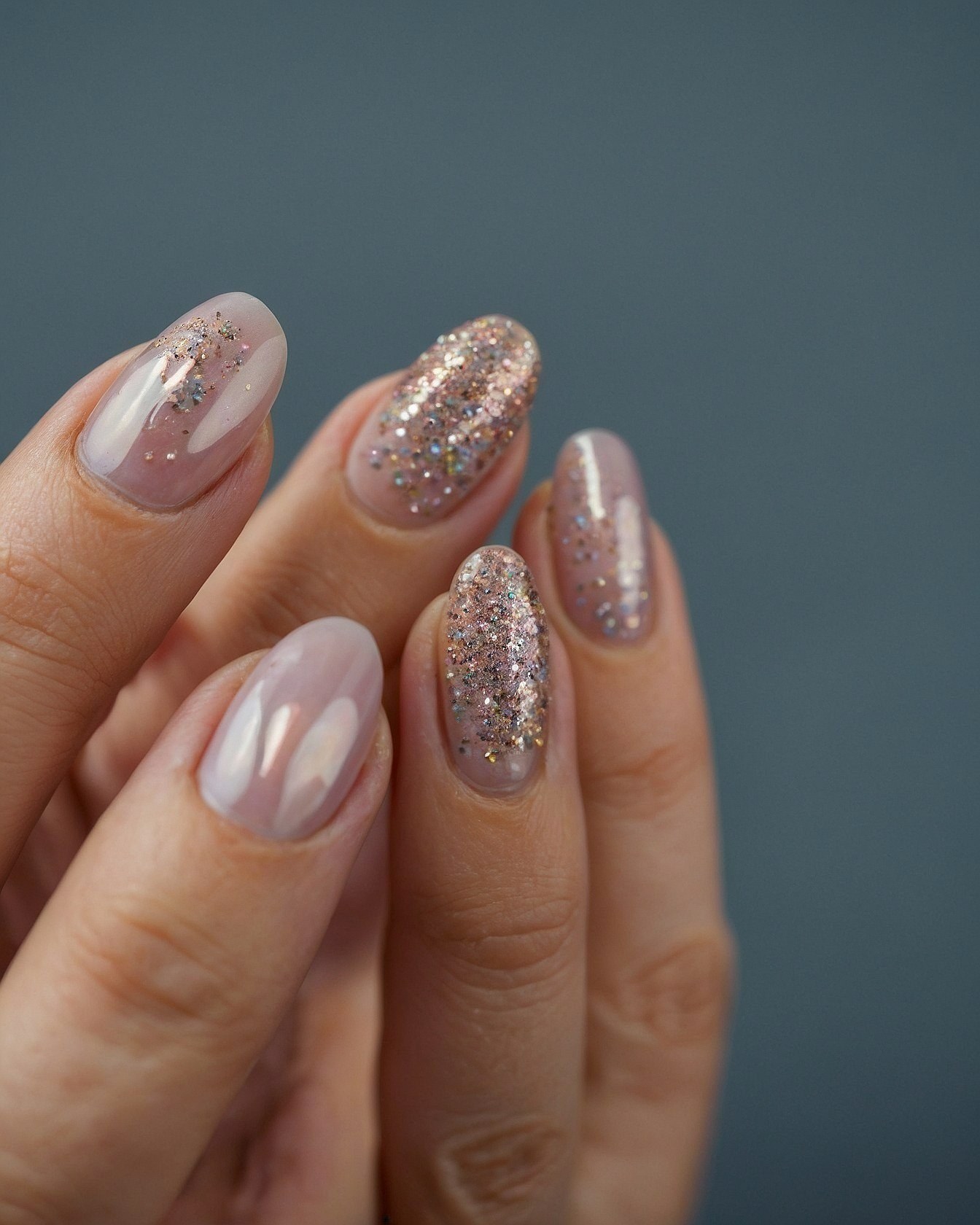 Shimmering Glitters on Oval Nails