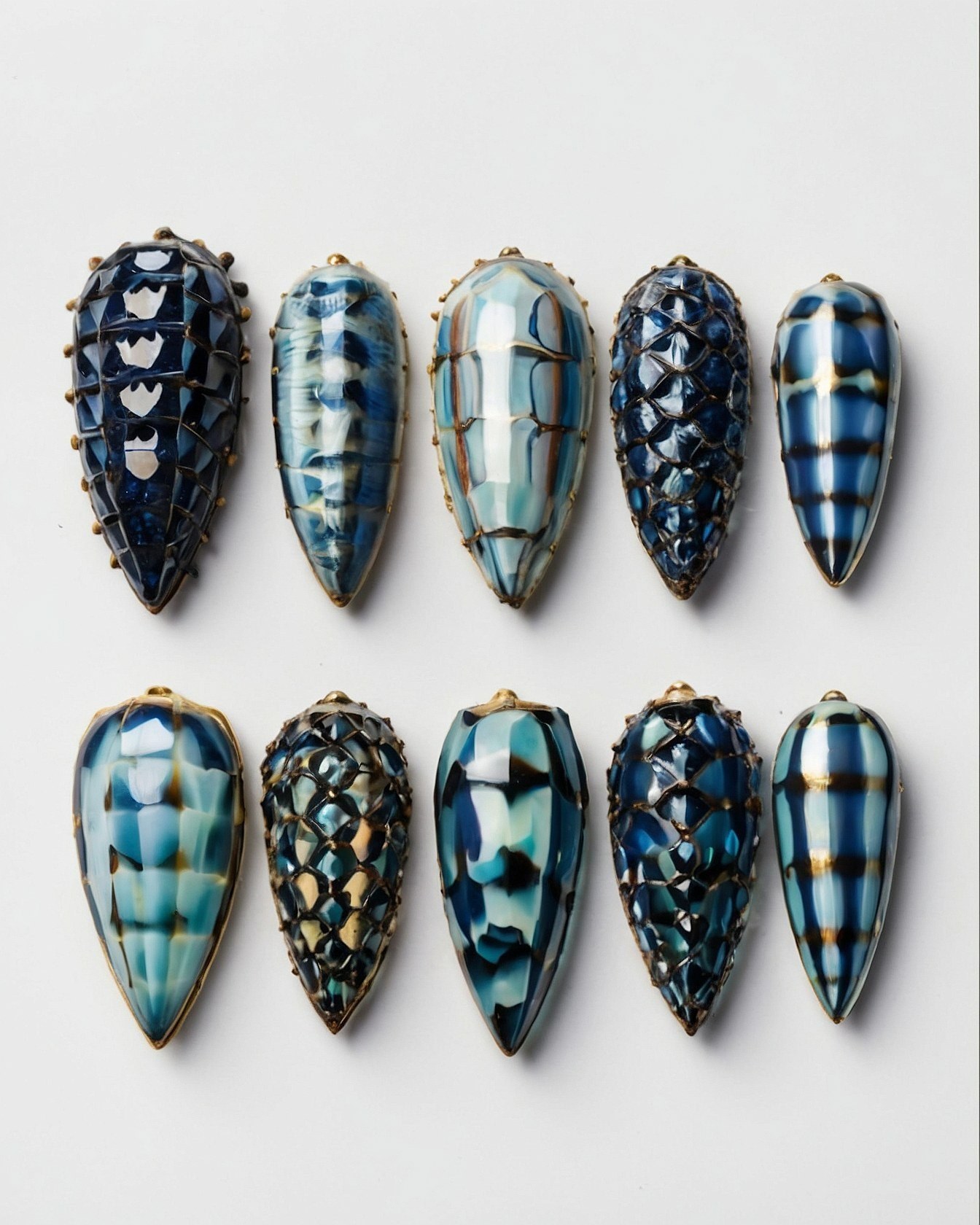 Intricate Blue and Teal Nail Art Details