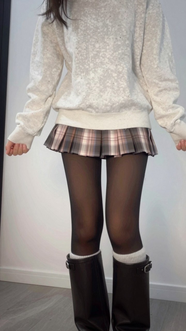 Styling Sweaters With Pleated Skirts and Tall Boots
