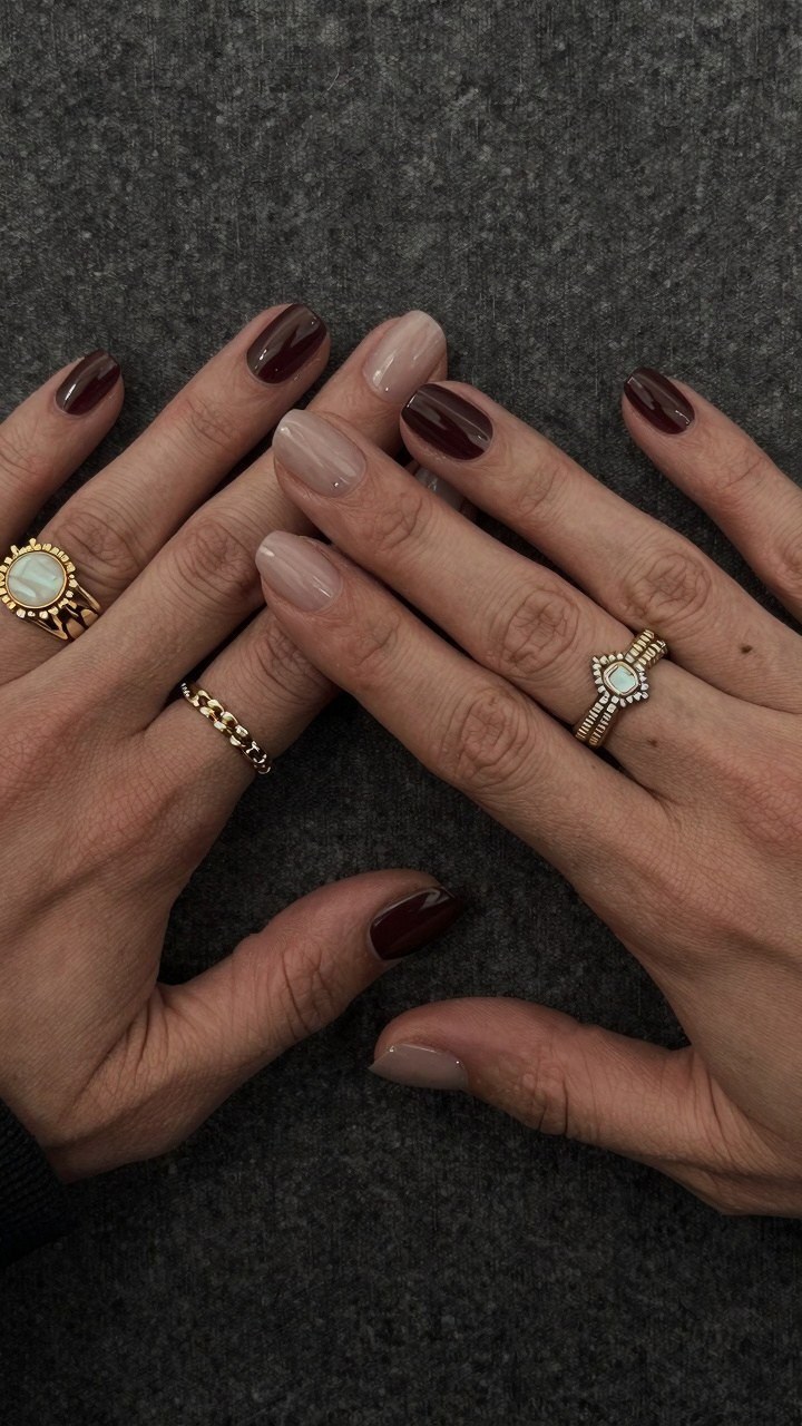 Choosing Between Solid Burgundy and Neutral Accent Nails