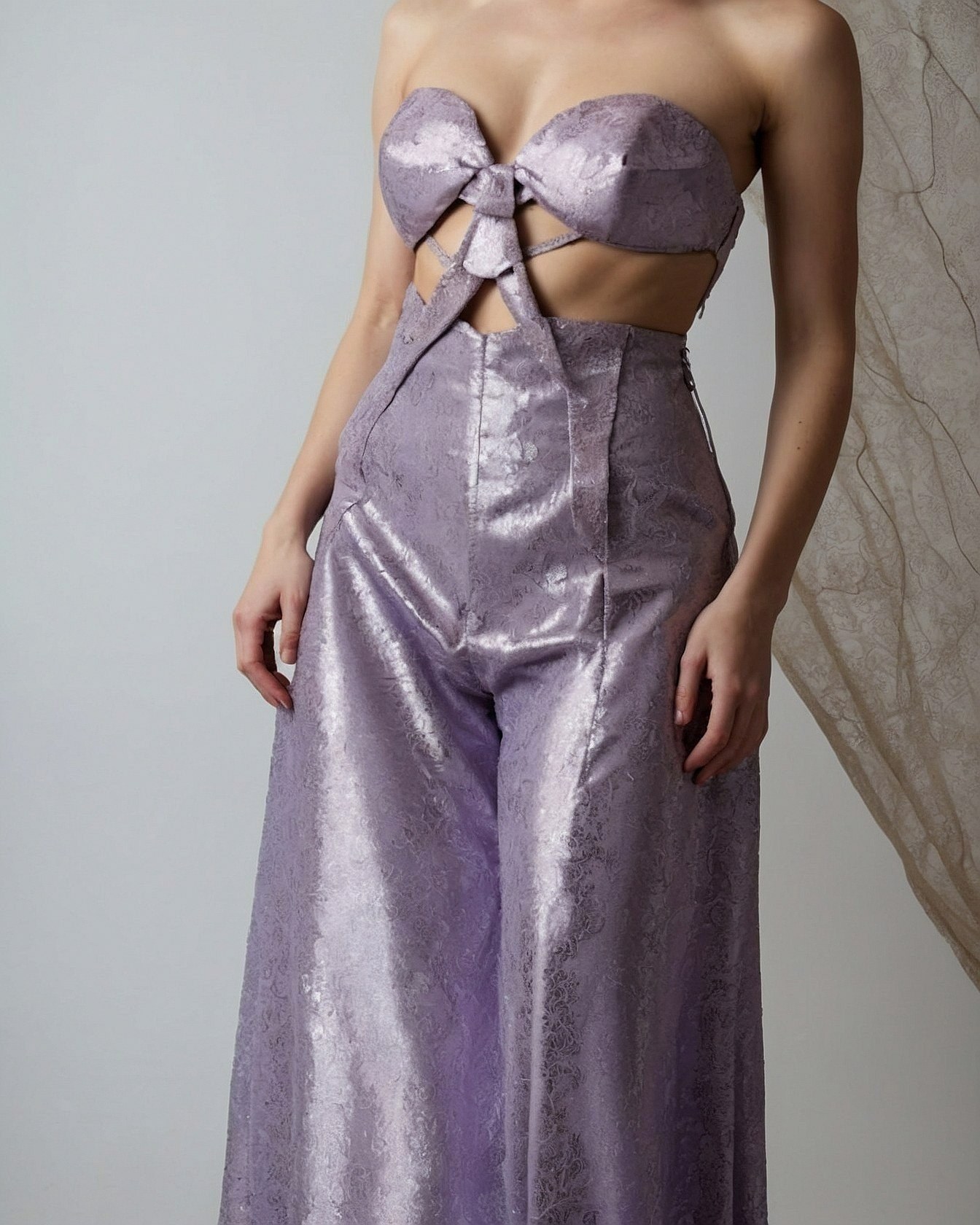 Lilac Hues in a Shimmering Cut-Out Ensemble