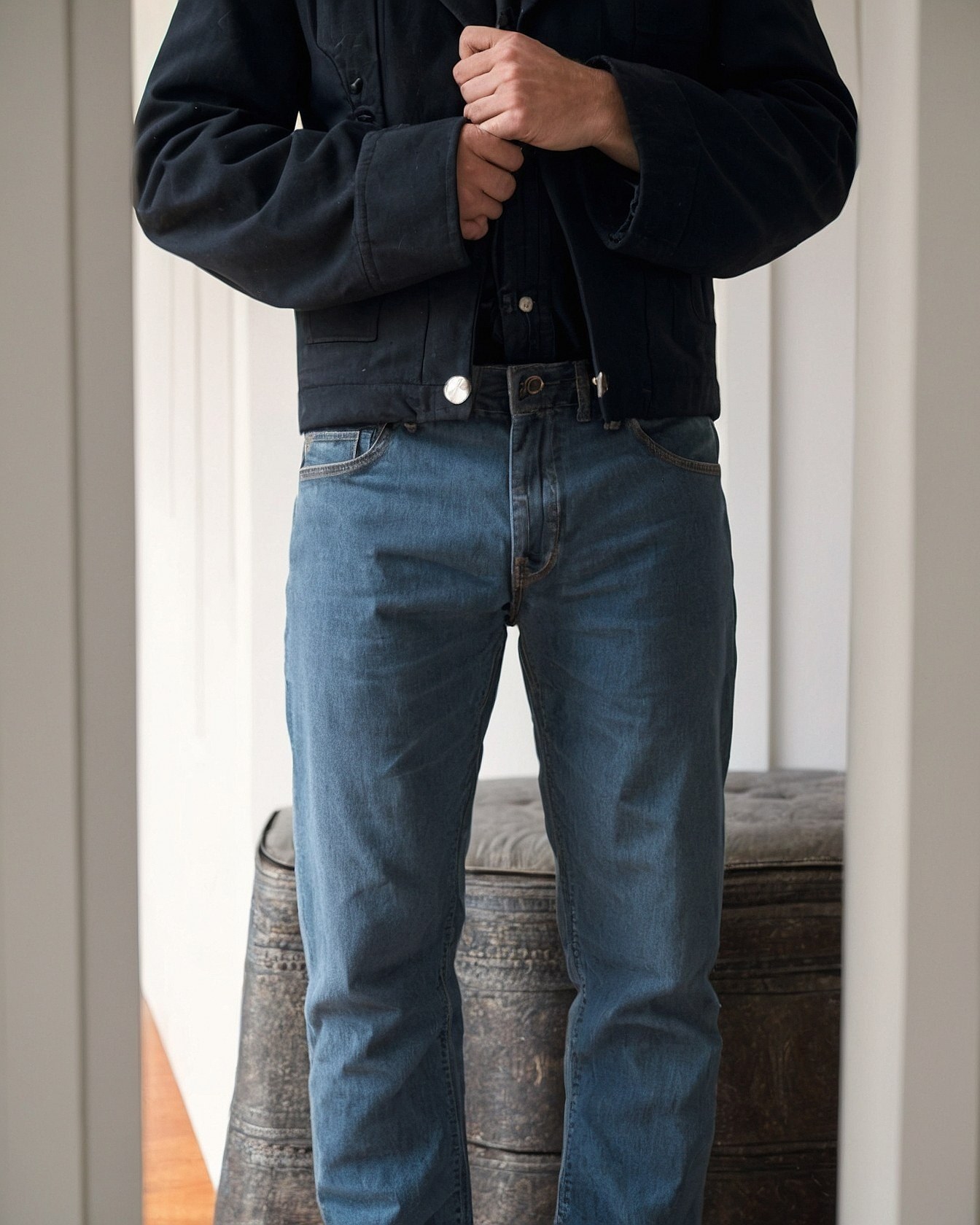Black Quilted Jacket and Washed Denim Ensemble