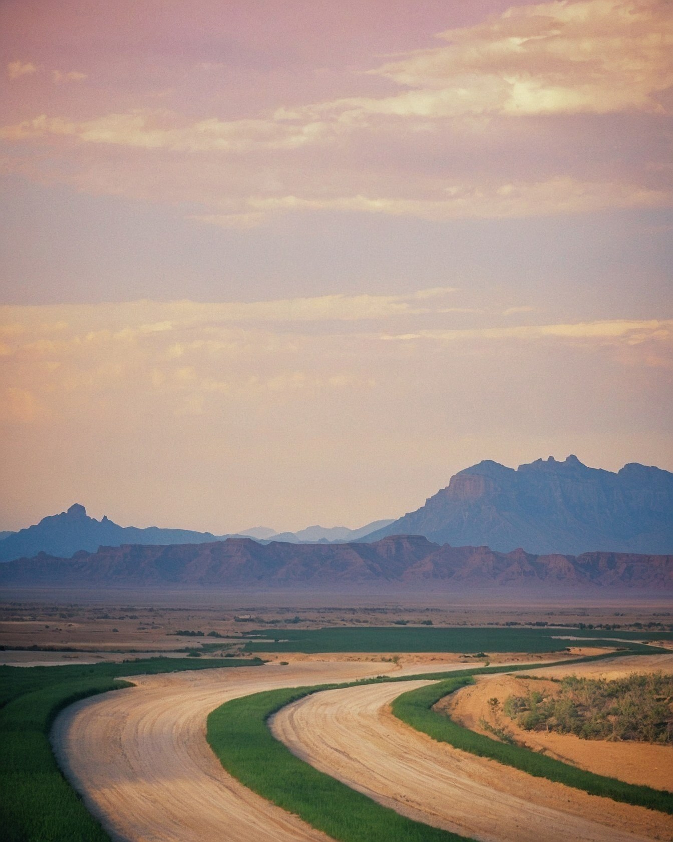 Horizon line painted with dusty rose and lavender hues