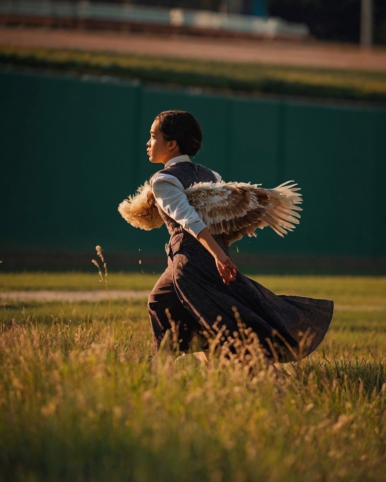 Running Through Golden Fields with Ethereal Wings