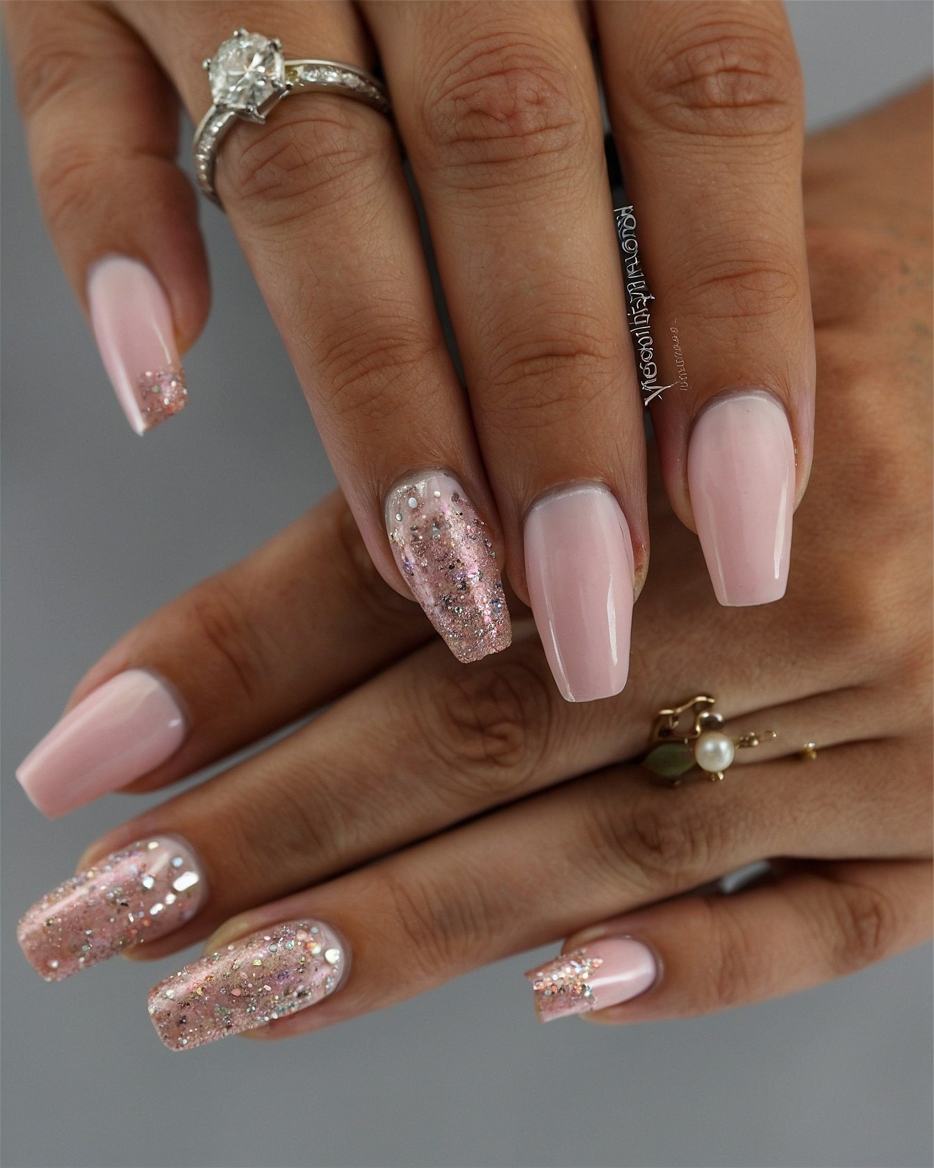 Close-up of Soft Pink and Rose Gold Glitter Nails