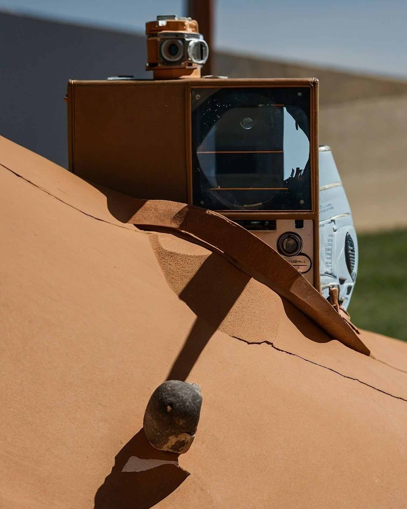 Rusty Copper and Warm Taupe Against a Faded Sky