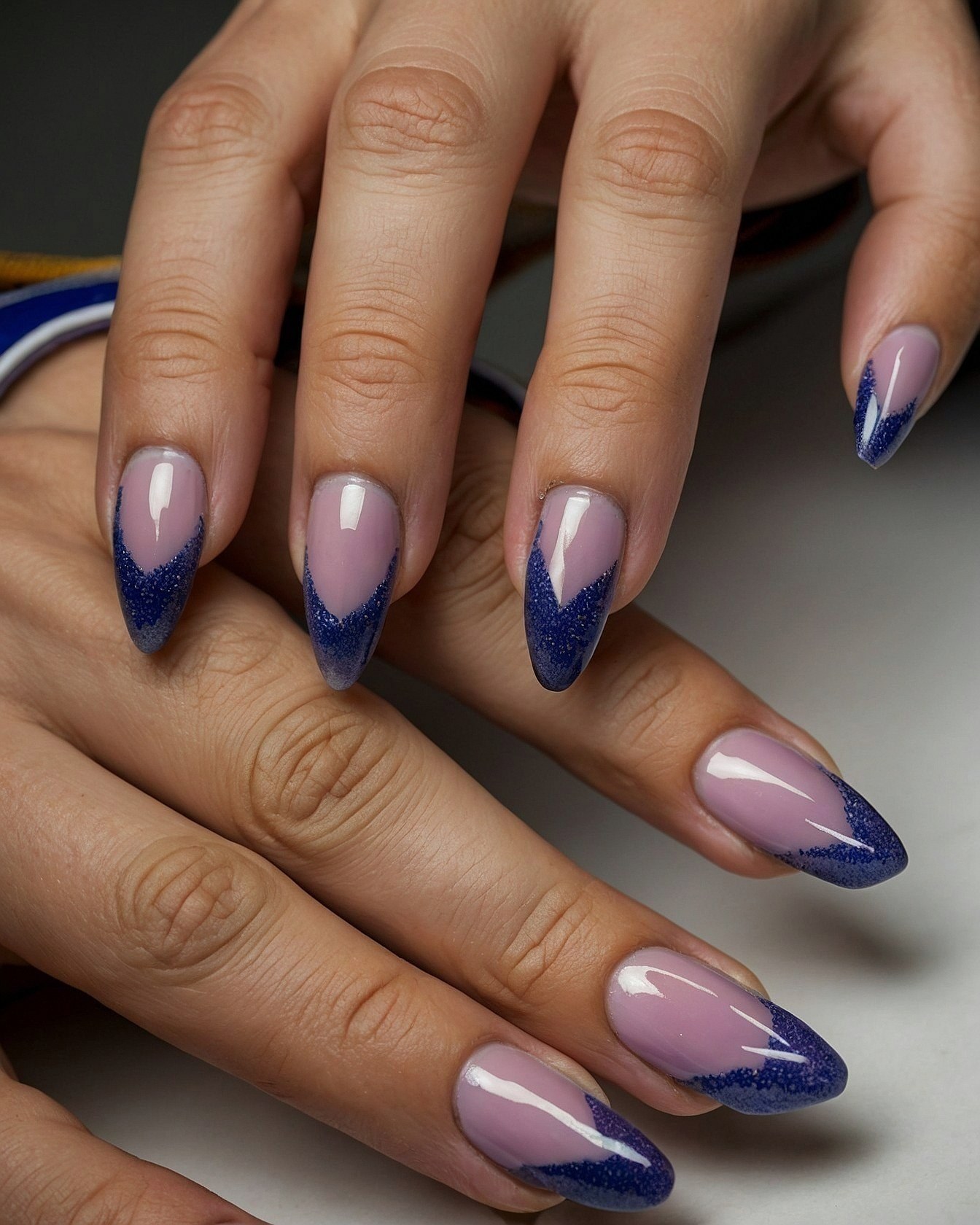 Sparkling Blue V-Tip Nails for Warm Days