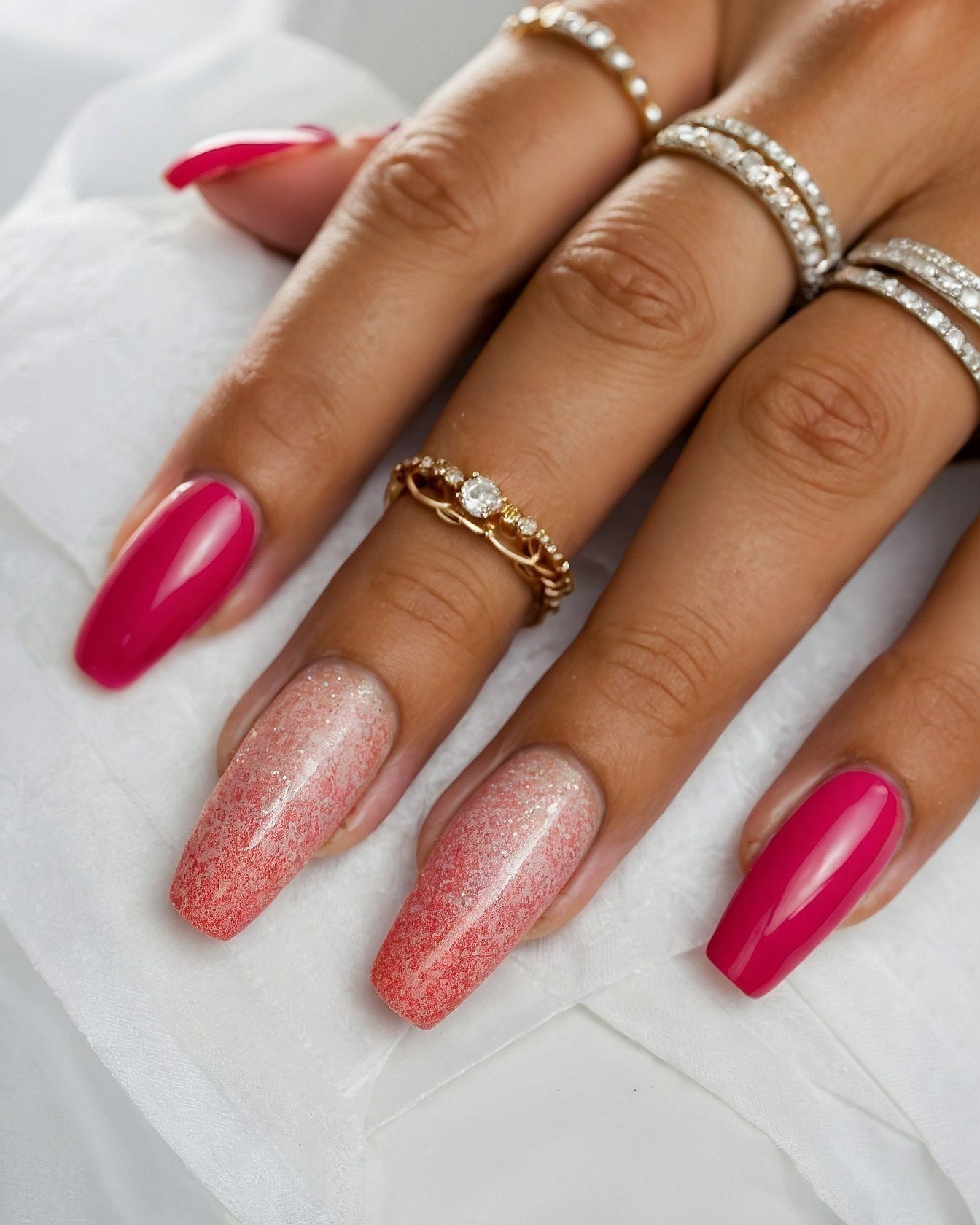 Maintaining Long Magenta and Sparkle Gradient Nails