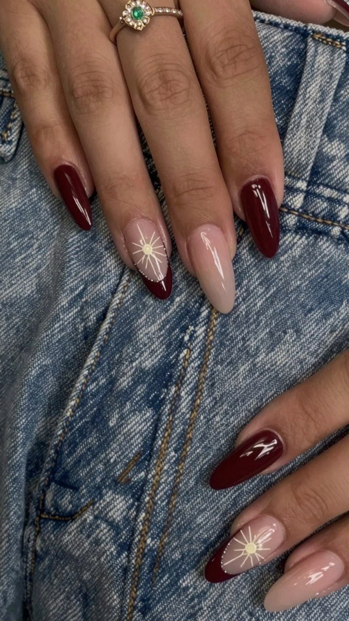 Adding Celestial Sunburst Details to Burgundy Nails
