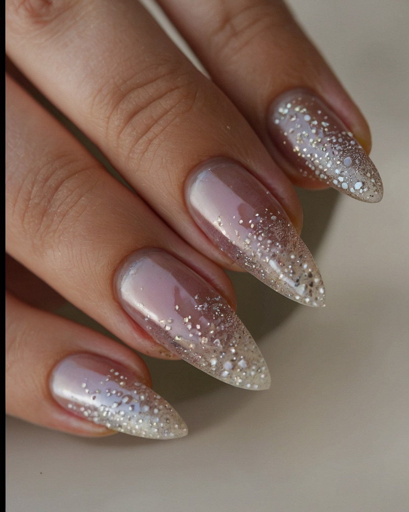 Pointed Nails: Opalescent Sheen Meets Sparkling Glitter