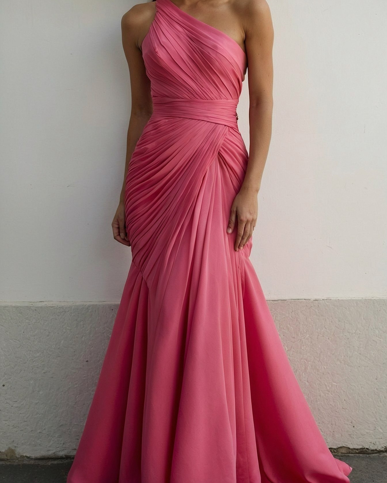 Draped Coral Satin Contrasts with Sculptural Silhouette