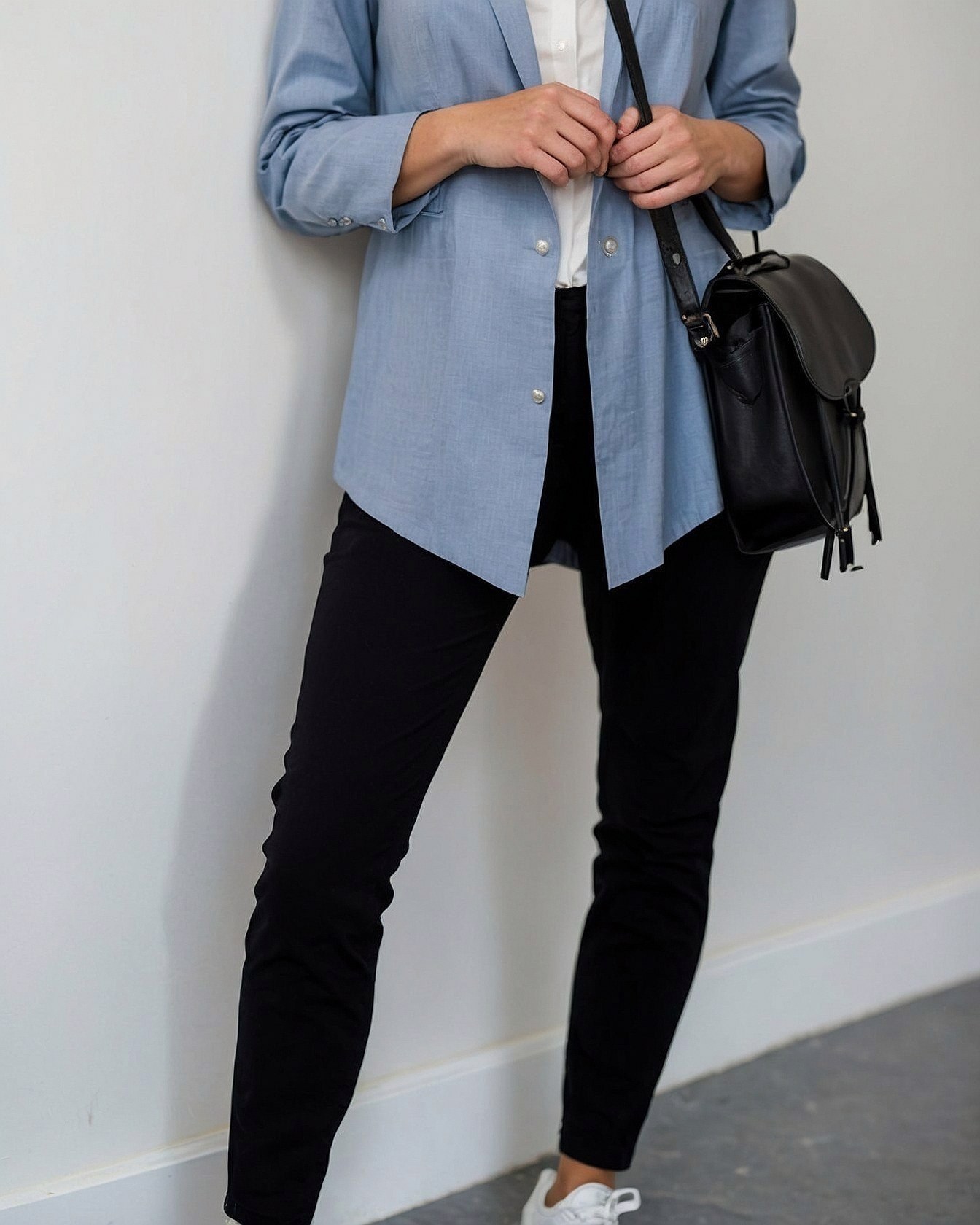 Soft Blue Blazer paired with Sleek Black Trousers