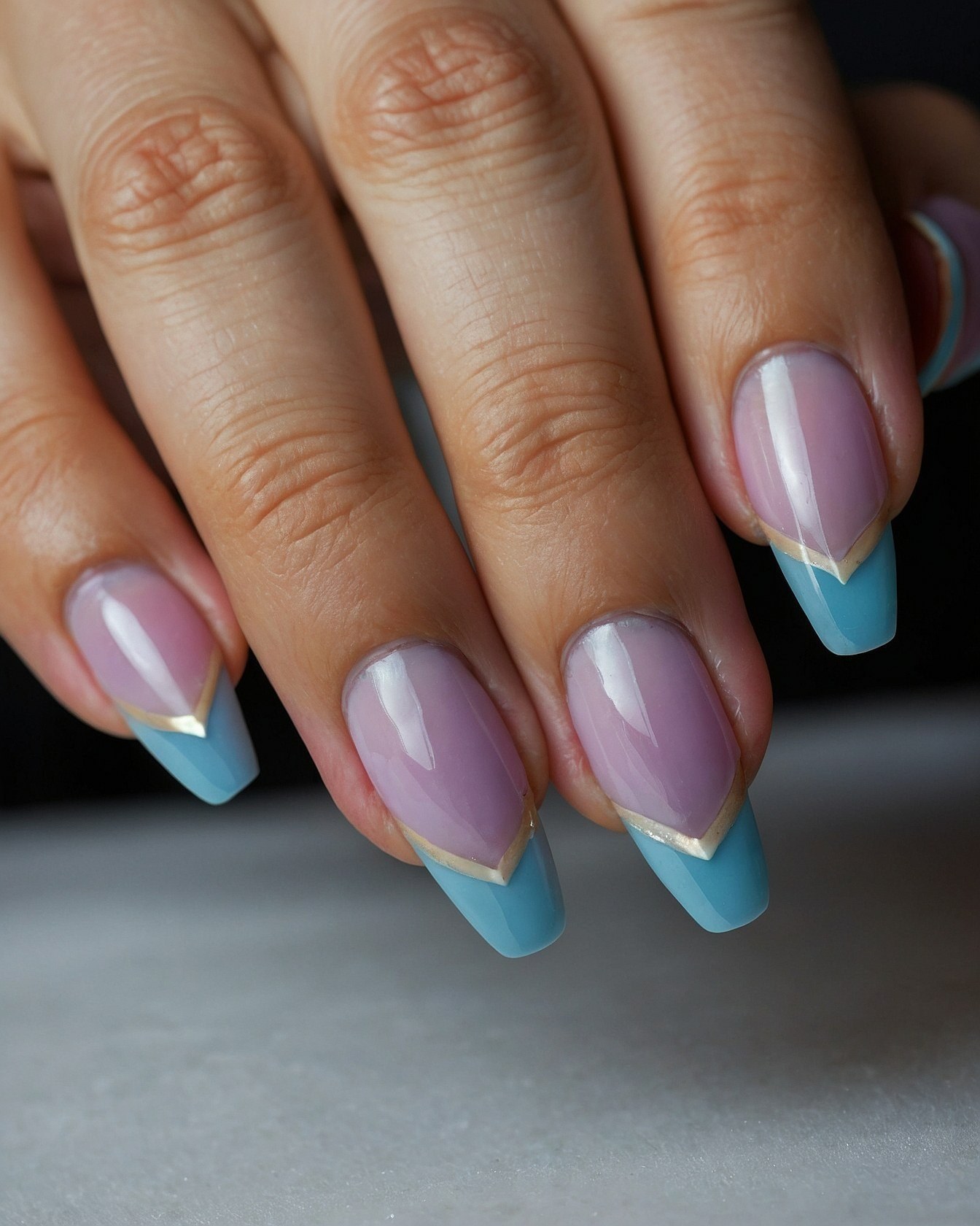 Geometric Angles Meet Soft Pastels on Almond Nails