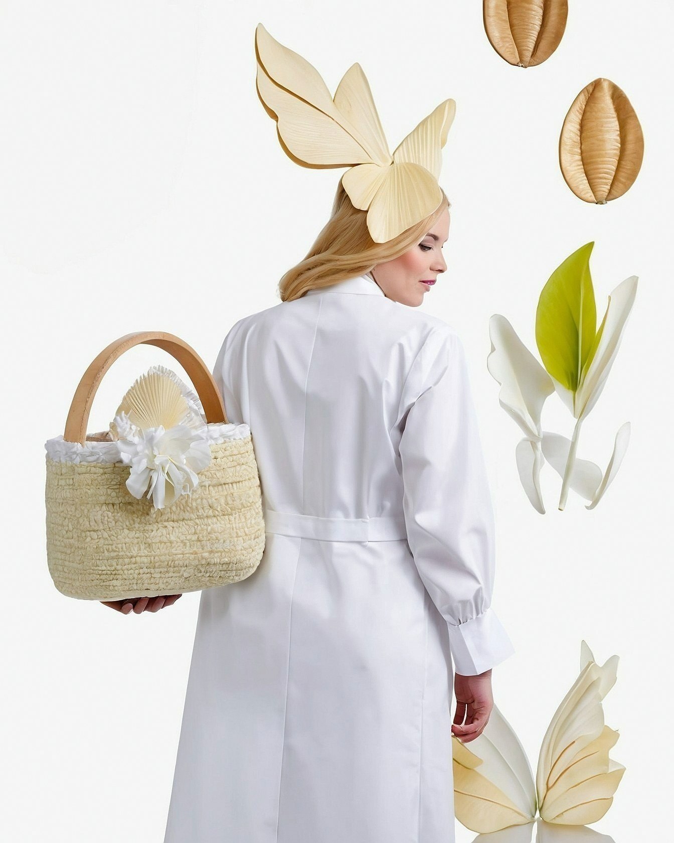 White Coat Contrasts with Whimsical Butterfly Headpiece
