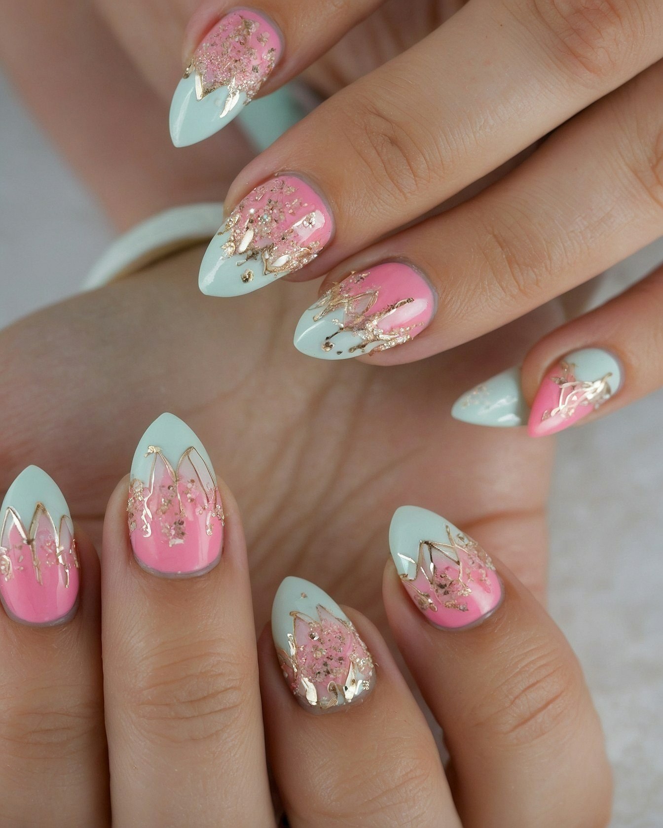Soft Pink and Mint Almond Nails with Gold Leaf Accent