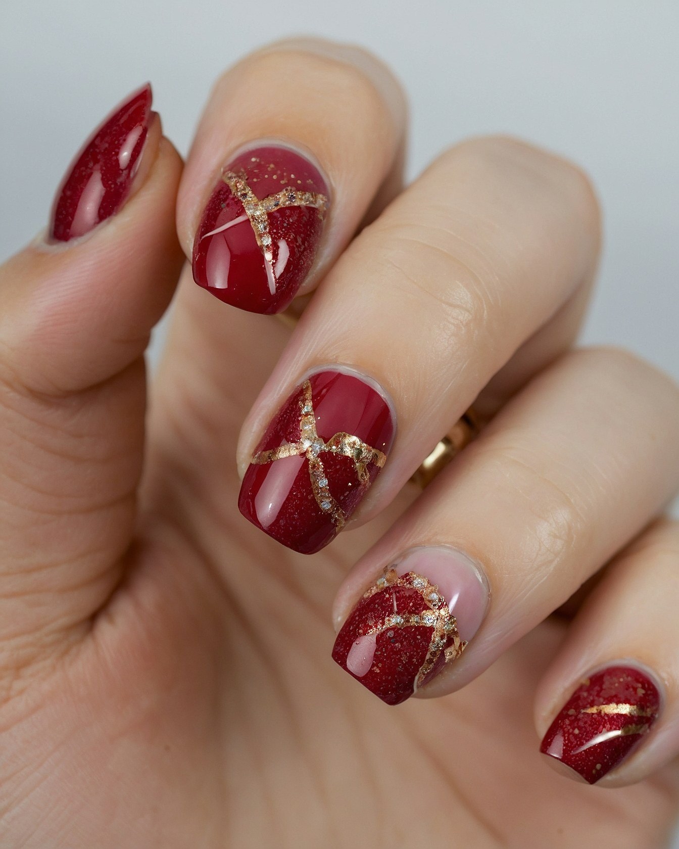 Glittering Deep Red Contrasted with Delicate Gold Accents