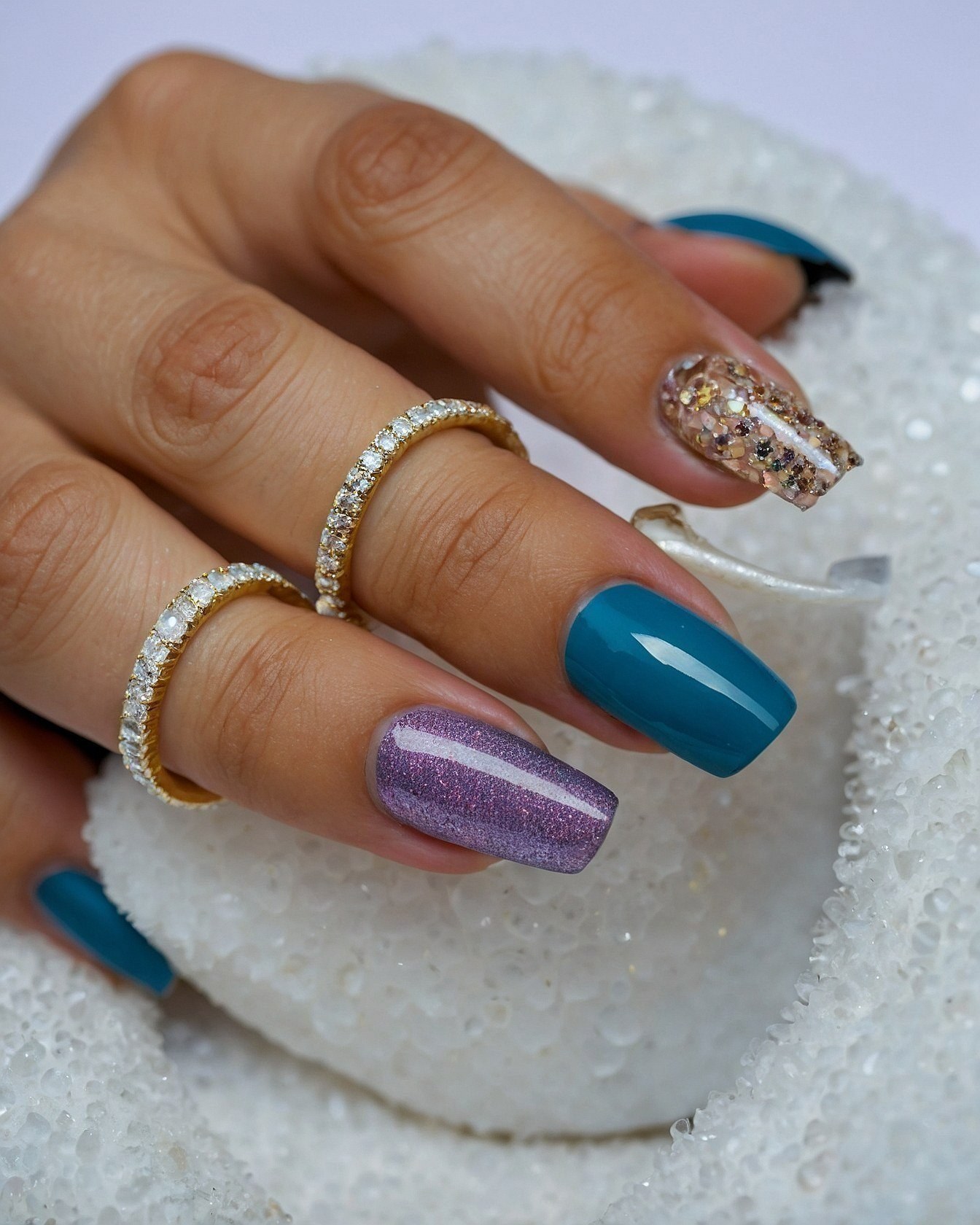 Contrasting Teal and Glitter Accents on Coffin Nails