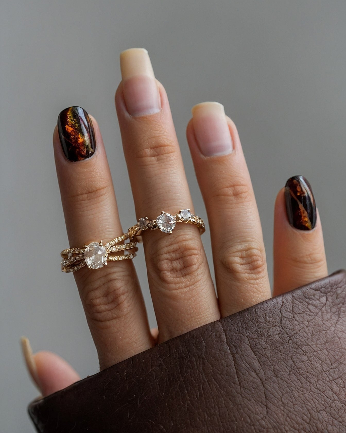Dramatic Swirls Meet Subtle Sparkle: A Striking Contrast