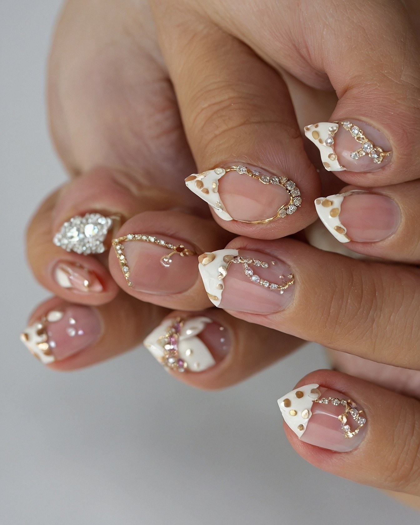 Juxtaposed Gem Accents on Pearlescent Tips