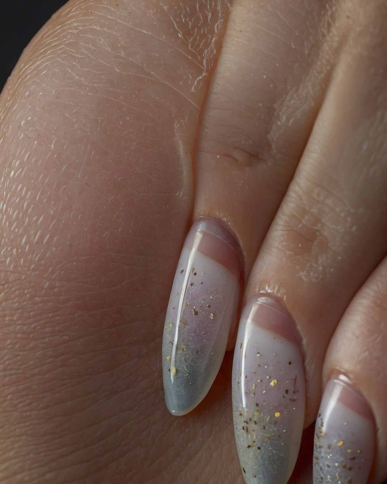 Close-up of Almond Nails with Subtle Shimmer