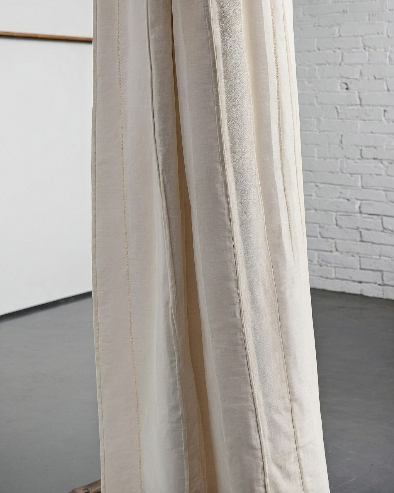 Structured Crease Meets Flowing Linen Drape