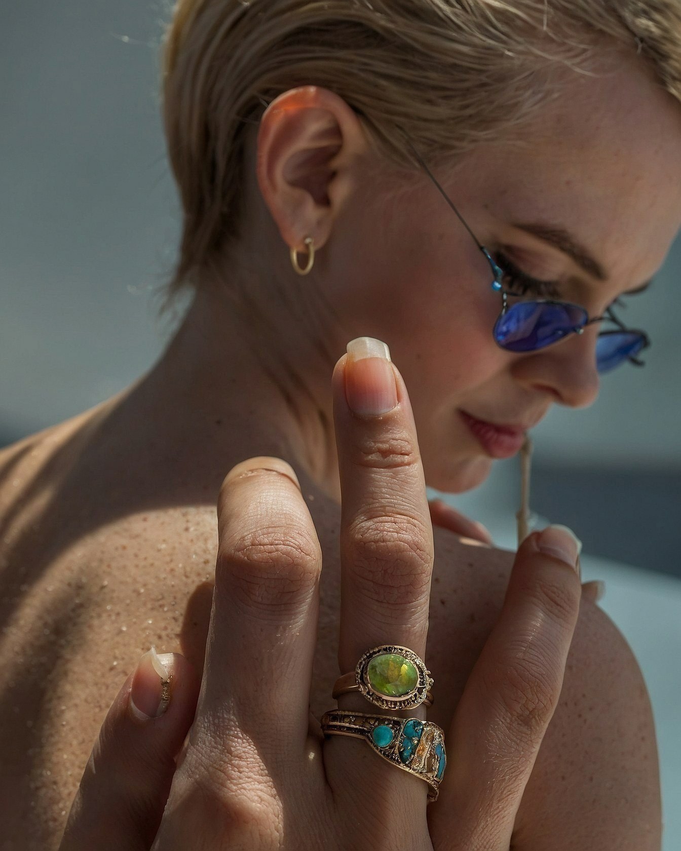 Close-up of a woman’s hand with vintage rings