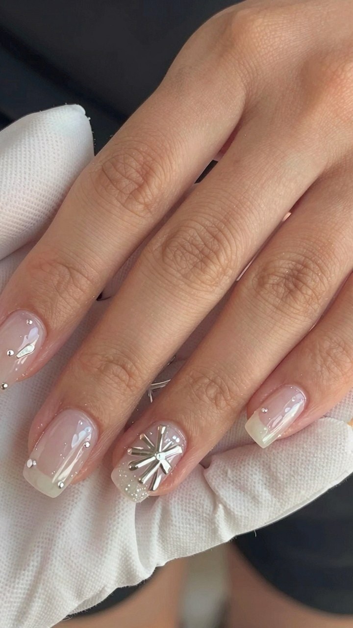 Adding Metallic Charms to White SNS Nail Designs