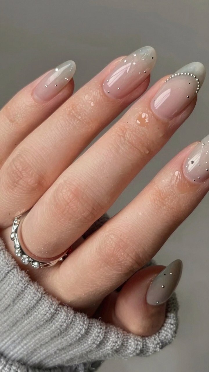Adding Metallic Studs to Brown Swirl Nail Art