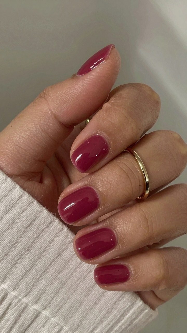 Pairing Glossy Black Cherry Nails With Simple Rings