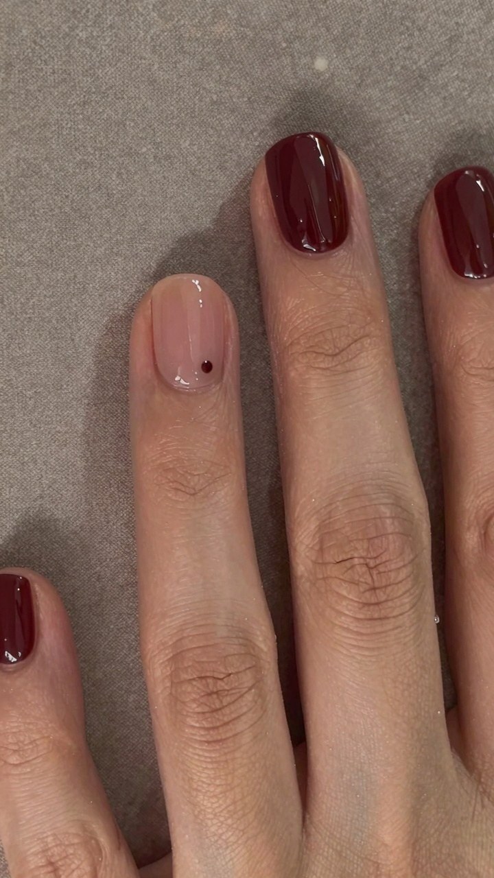 Adding Tiny Burgundy Dots to Nude Nails