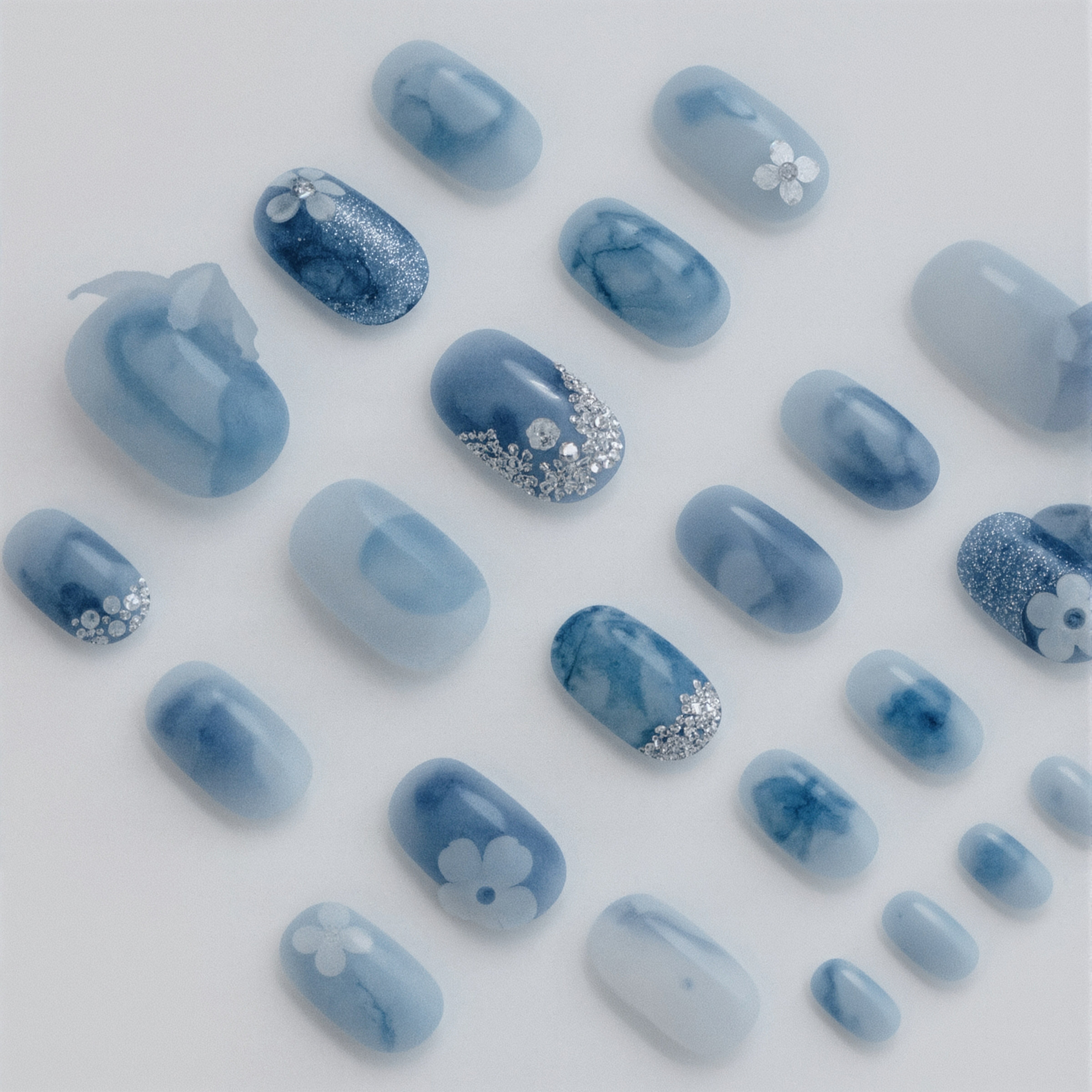 Elegant Blue Ombre Floral Nails: Summer 2024 Hand-Painted Designs