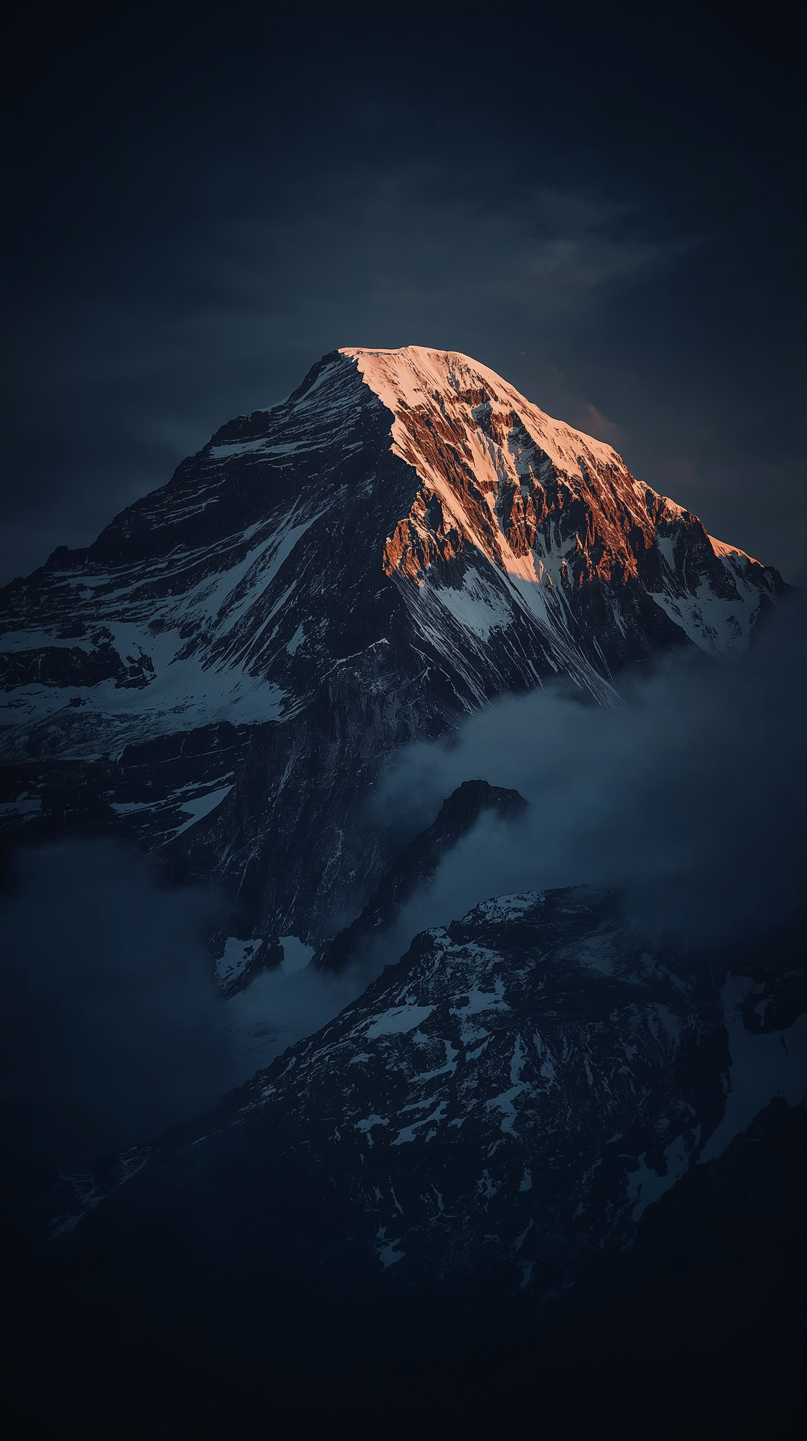 Dramatic 4K Mountain Peak: Moody iPhone Lock Screen Wallpaper